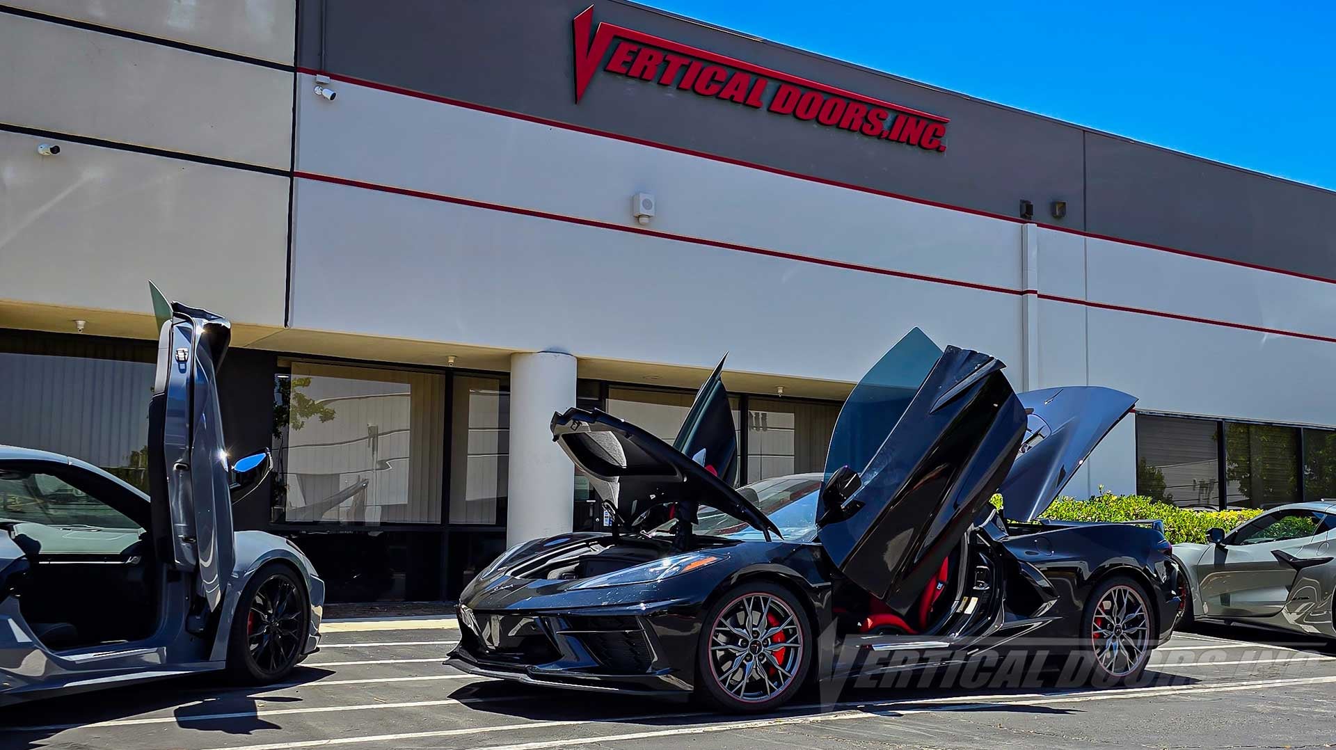 Vertical Lambo Door Kit installed on a Black Chevrolet Corvette C8 from Colorado, by Vertical Doors, Inc.