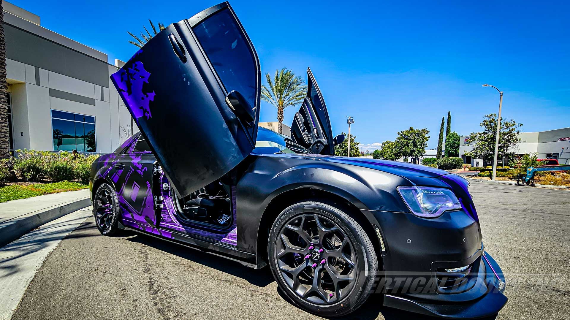 Lambo Doors on @navarro_345v8 Chrysler 300 installed by Vertical Doors, Inc.