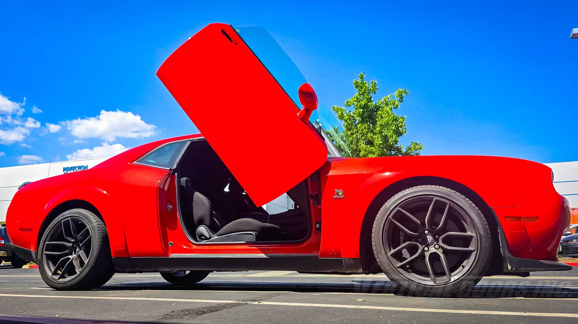 From Nevada to California, Lambo Doors Installed on a Challenger Scat Pack by the Best in the Business, Vertical Doors, Inc.