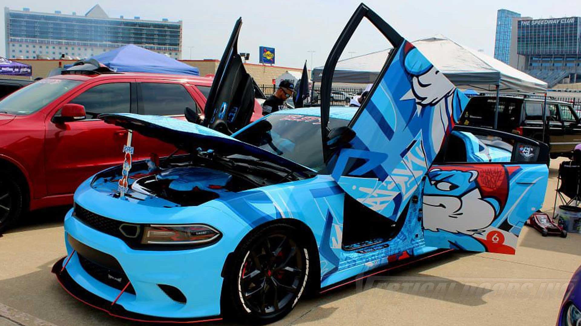 @ poppa_smurf_pr_ Dodge Charger from Florida featuring Vertical Doors, Inc. door conversion kit. AKA "Lambo Doors"