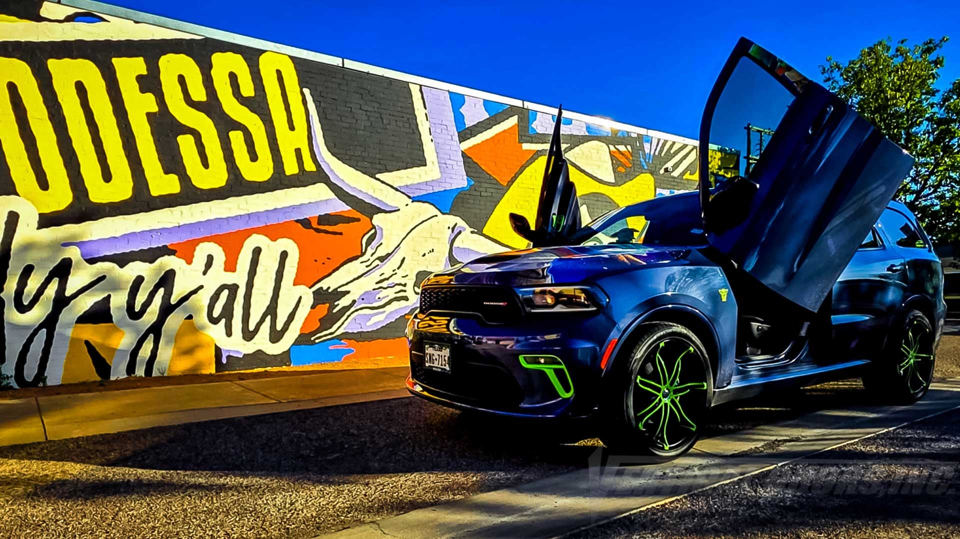 Turning Heads in Texas: @babyyoda_rango's Dodge Durango GT with Vertical Lambo Doors!