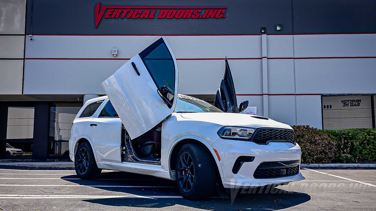 Check out the @thehellrango Dodge Durango from Illinois showing off a lambo door kit by Vertical Doors, Inc.