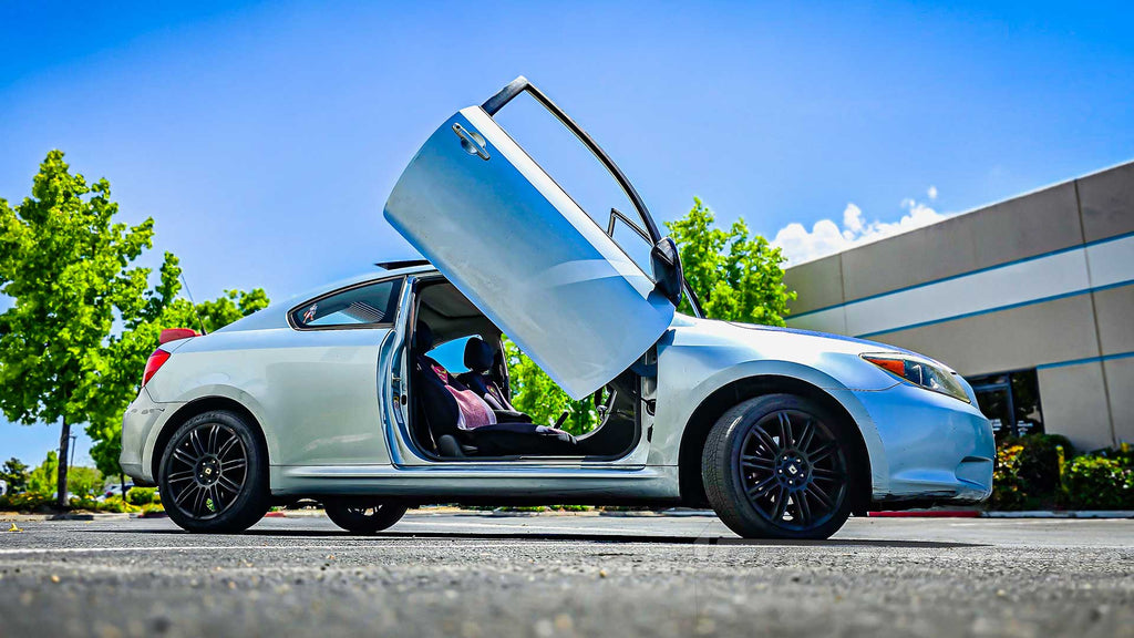 Check out George’s Scion TC from California showing off a lambo door kit by Vertical Doors, Inc.