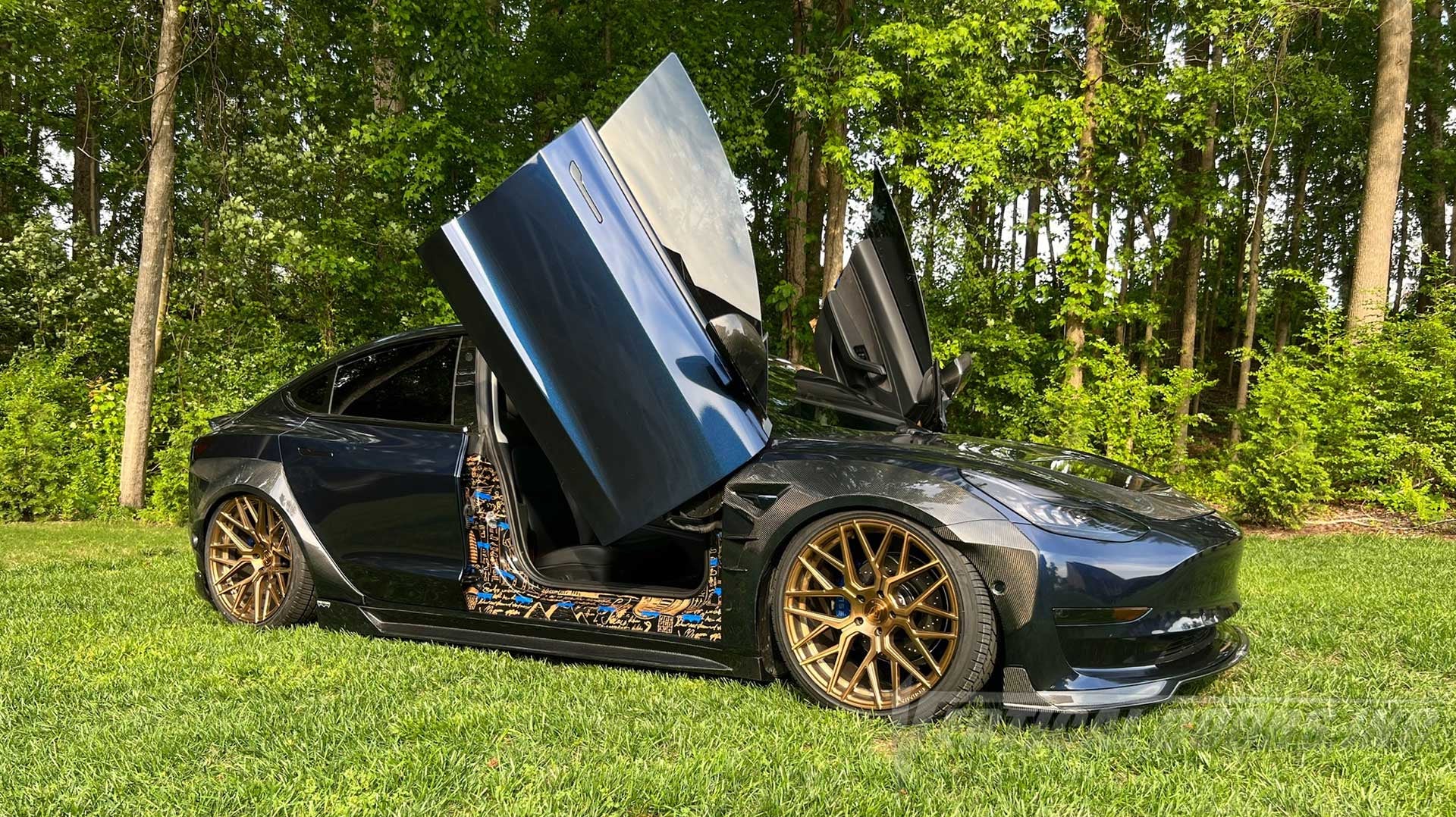 Installer | TESLA MODS NC | Raleigh NC | Tesla Model 3 featuring Vertical Doors, Inc. vertical lambo door conversion kit.
