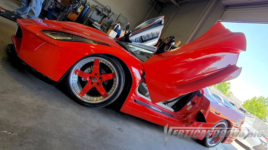 Acura NSX featuring Vertical Lambo Doors Conversion Kit by Vertical Doors, Inc. and body kit by Santarsiero Concepts.