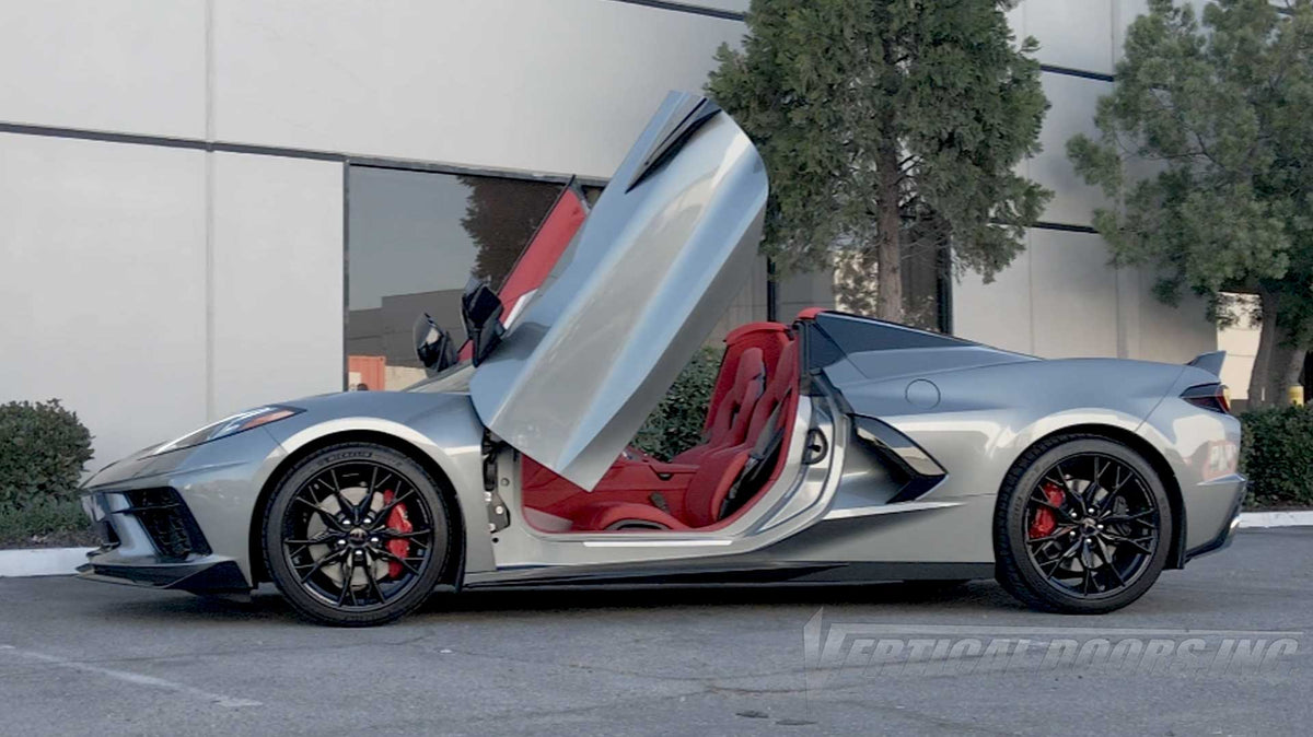 Silver Chevrolet Corvette C8 featuring Door conversion kit by Vertical Doors, Inc. AKA "Lambo Doors"