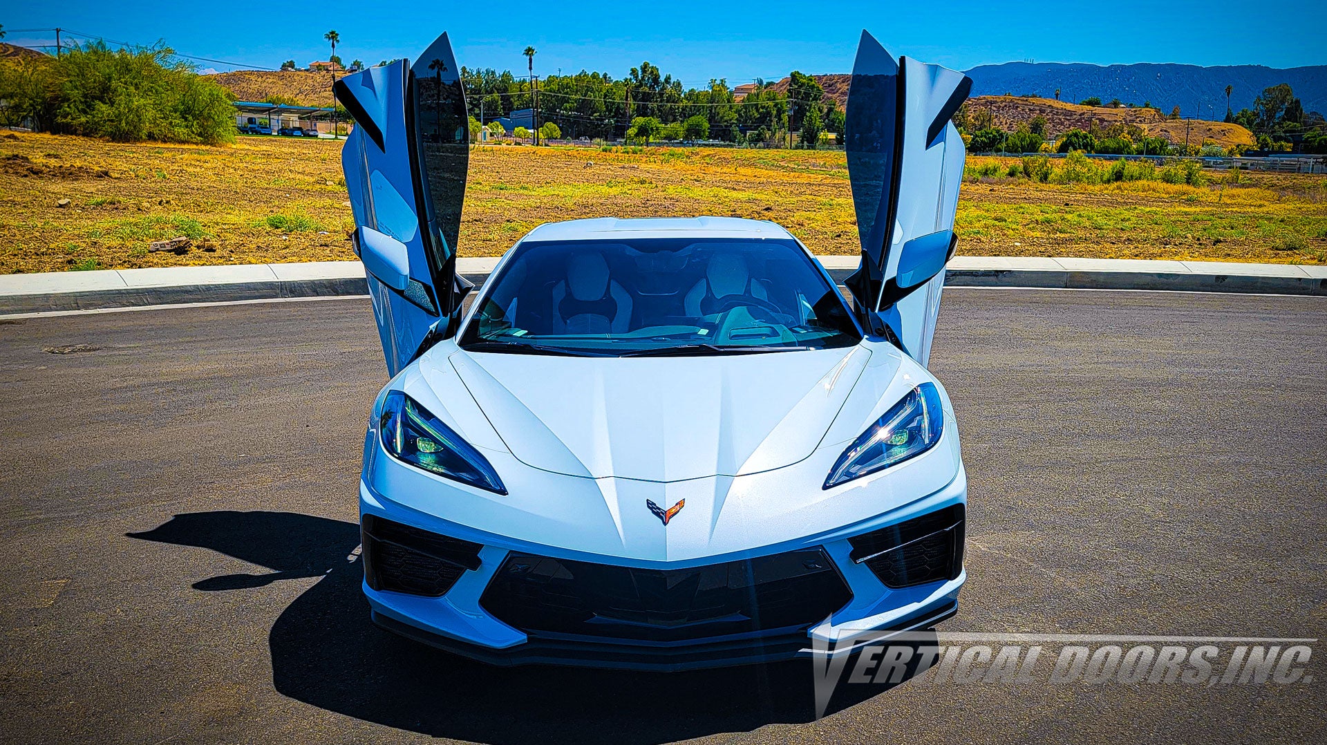 Chevrolet Corvette C8 Ceramic Matrix Gray Metallic from California featuring Vertical Door conversion kit by Vertical Doors, Inc. AKA "Lambo Doors"