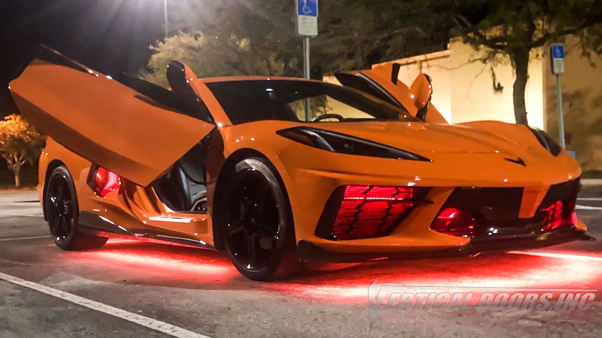 Sebring Orange Chevrolet Corvette C8 from Florida featuring ZLR Door conversion kit by Vertical Doors, Inc.