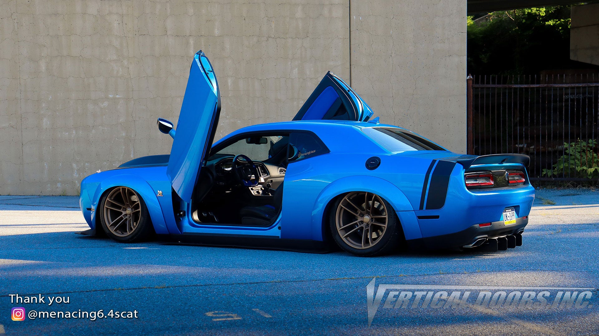 Check out Frank's @menacing6.4scat Dodge Challenger from Pennsylvania featuring Vertical Doors, Inc. door conversion kit. AKA "Lambo Doors"