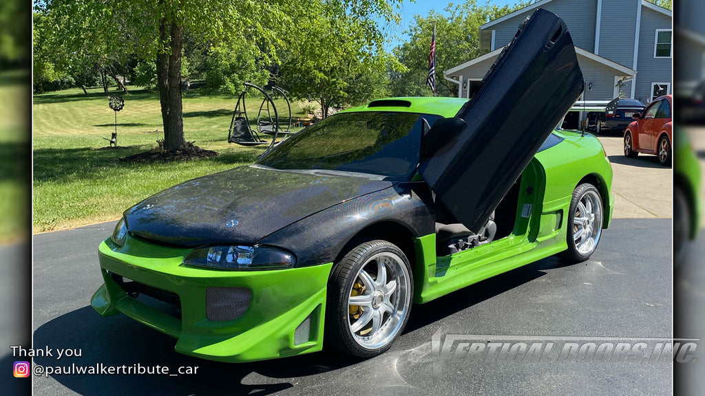 Check out Keith's @paulwalkertribute_car Mitsubishi Eclipse from Arizona featuring Vertical Lambo Doors Conversion Kit from Vertical Doors, Inc.