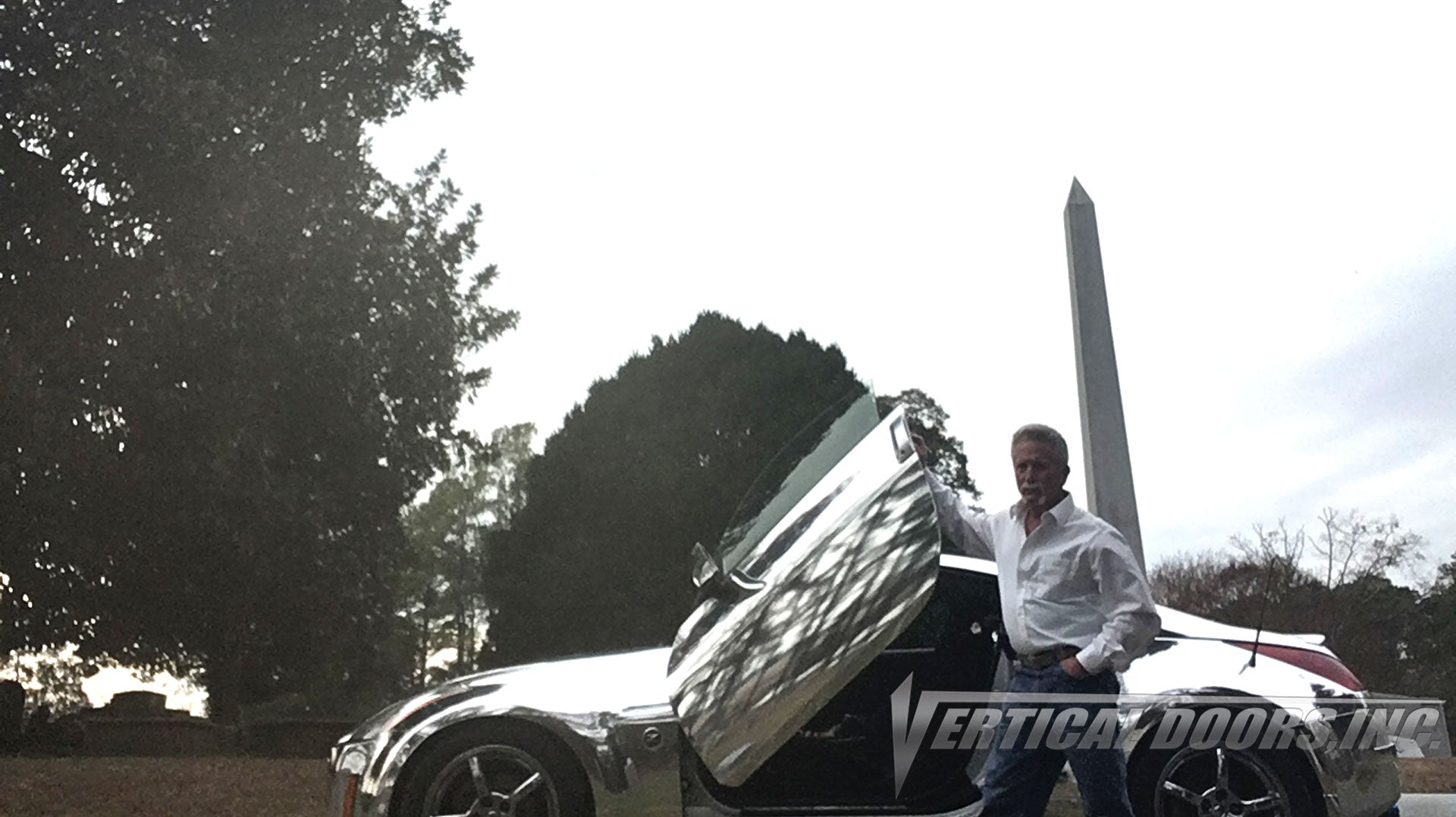 Check out Dicky's 2004 Nissan 350Z from Smithfield Virginia featuring Avery Chrome Wrap and Verical Doors, Inc. vertical doors conversion kit.