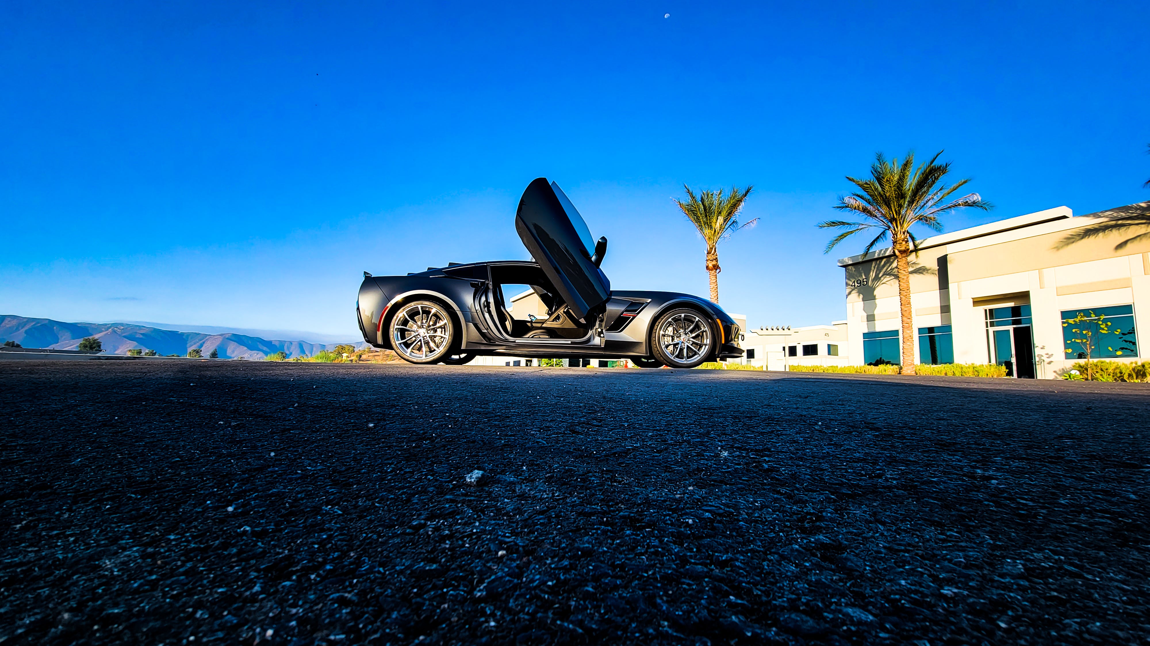 @lagniappe_catering Chevrolet Corvette C7 Grand Sport from California featuring Door conversion kit by Vertical Doors, Inc. AKA "Lambo Doors"