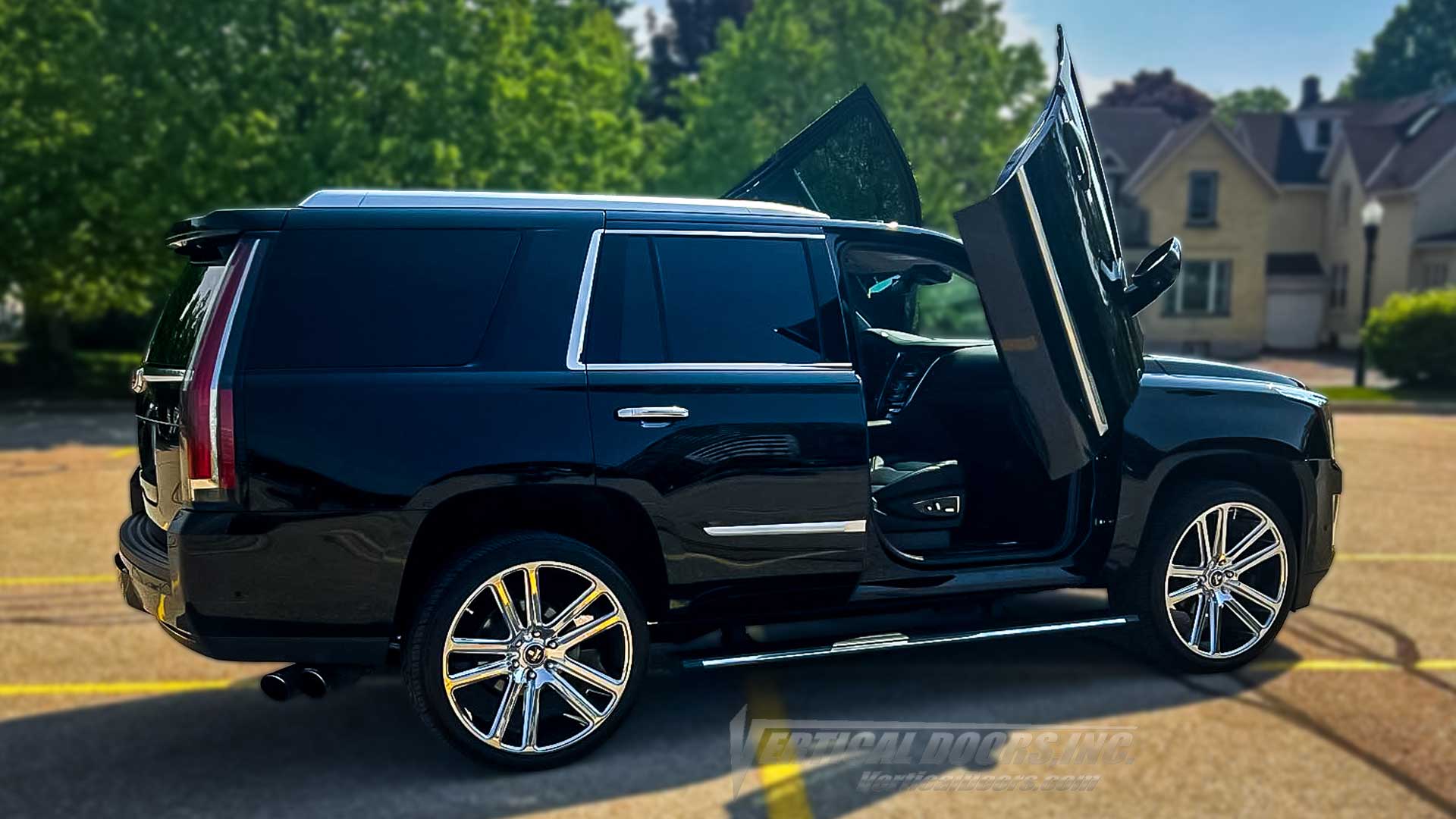 Black Cadillac Escalade ESV 2015–2020 showcasing Vertical Doors, Inc. scissor doors conversion kit VDCCADESC1520 installed in Ontario Canada luxury SUV with vertical opening doors
