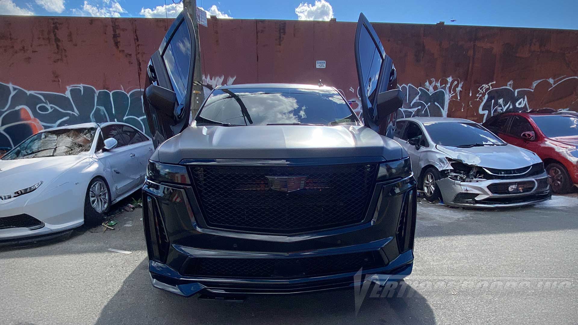 Check out @bxmoneymike 5th Gen 2023 Cadillac Escalade-V showing off Vertical Lambo Door kit by Vertical Door, Inc.