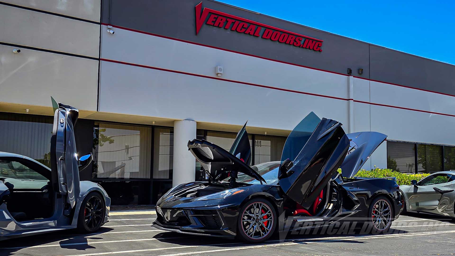 Vertical Lambo Door Kit installed on a Black Chevrolet Corvette C8 from Colorado, by Vertical Doors, Inc.