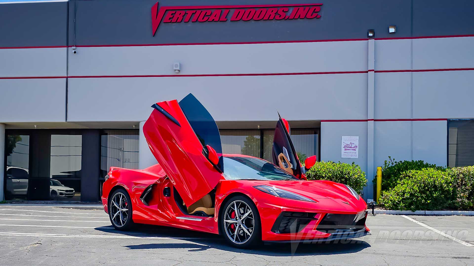 Red Chevrolet Corvette C8 from California getting a Vertical Lambo Door Kit installed by Vertical Doors, Inc.