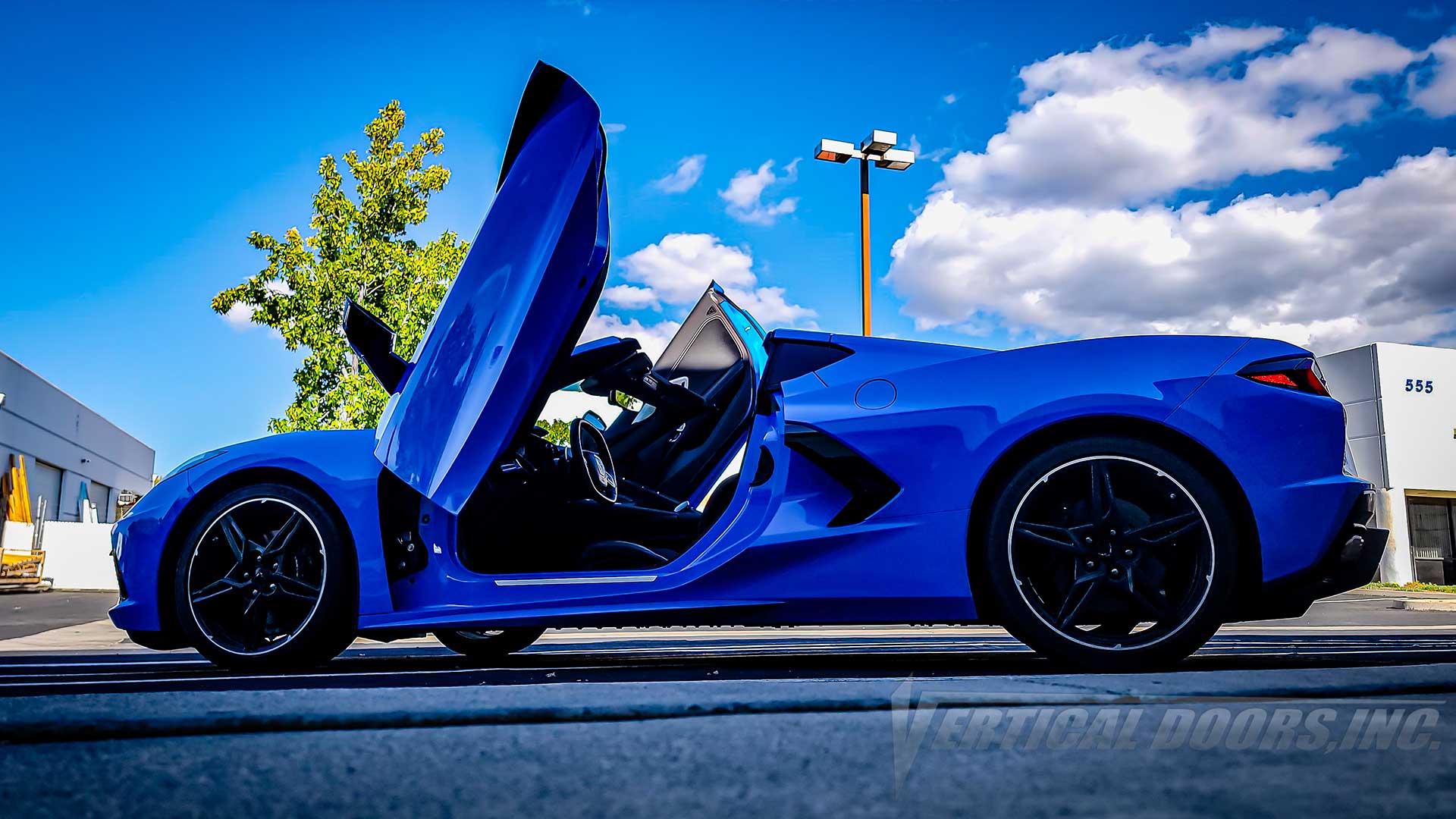 Vertical Lambo Door Kit installed on a Chevrolet Corvette C8, installed and manufactured by Vertical Doors, Inc.