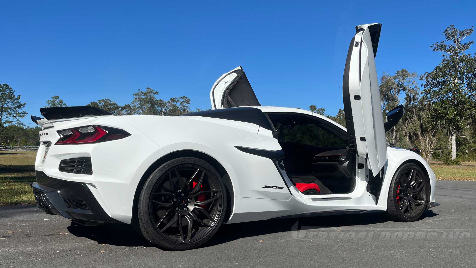 Installer | Xtreme Auto Repair | Townsend, GA | 2023 Chevrolet Corvette C8 Vertical Lambo Door Conversion Kit installation.