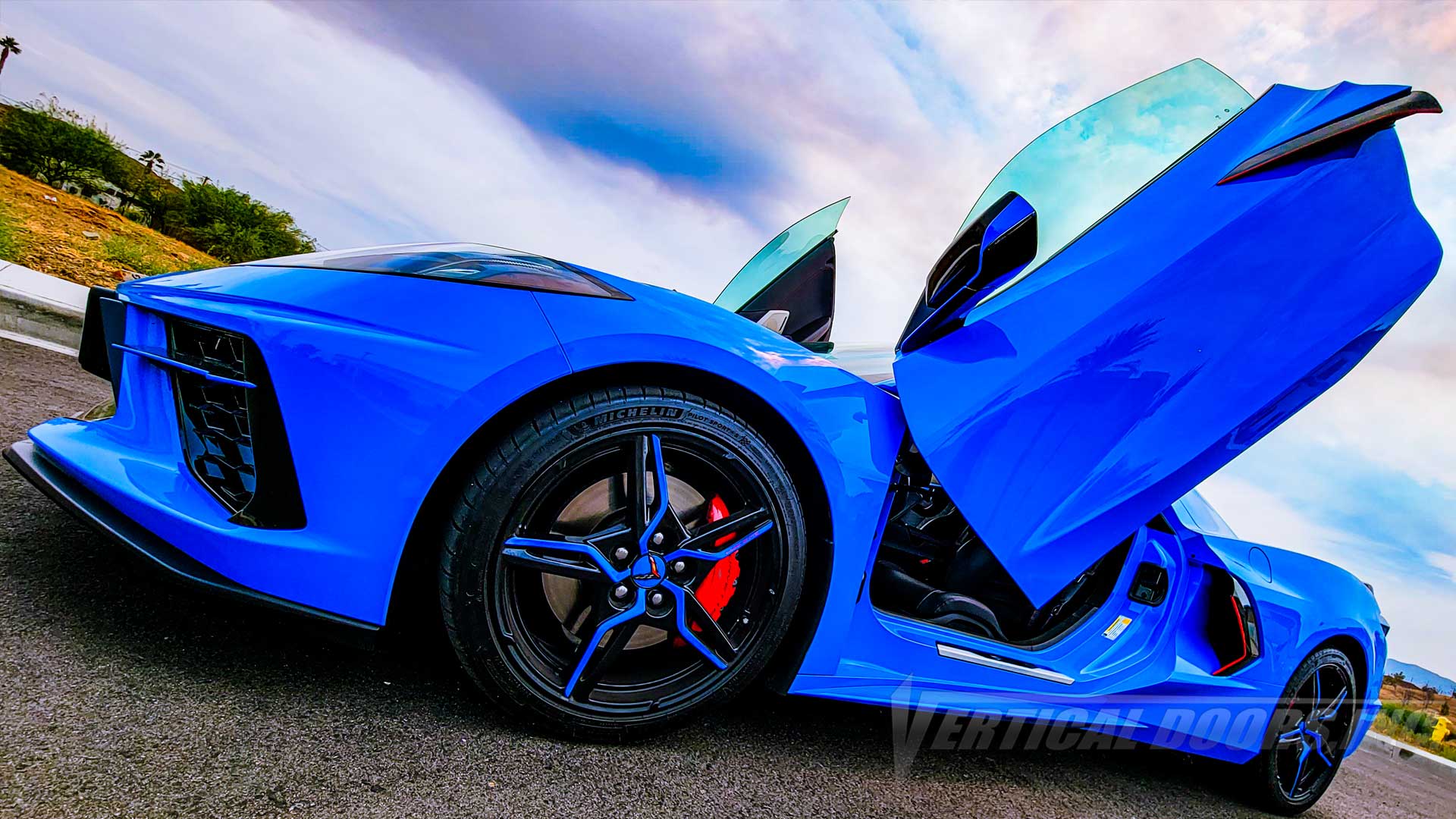 Rapid Blue C8 Corvette with Lambo Doors Conversion Kit