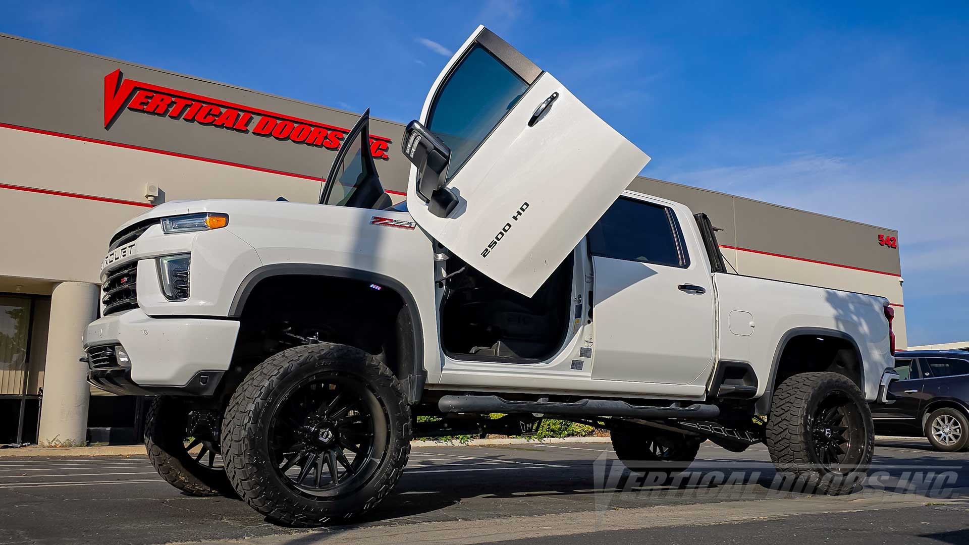Check out @3rdGP 4th Gen Chevrolet Silverado Duramax showing off Vertical Lambo Door Conversion kit by Vertical Door, Inc. and a few other upgrades.