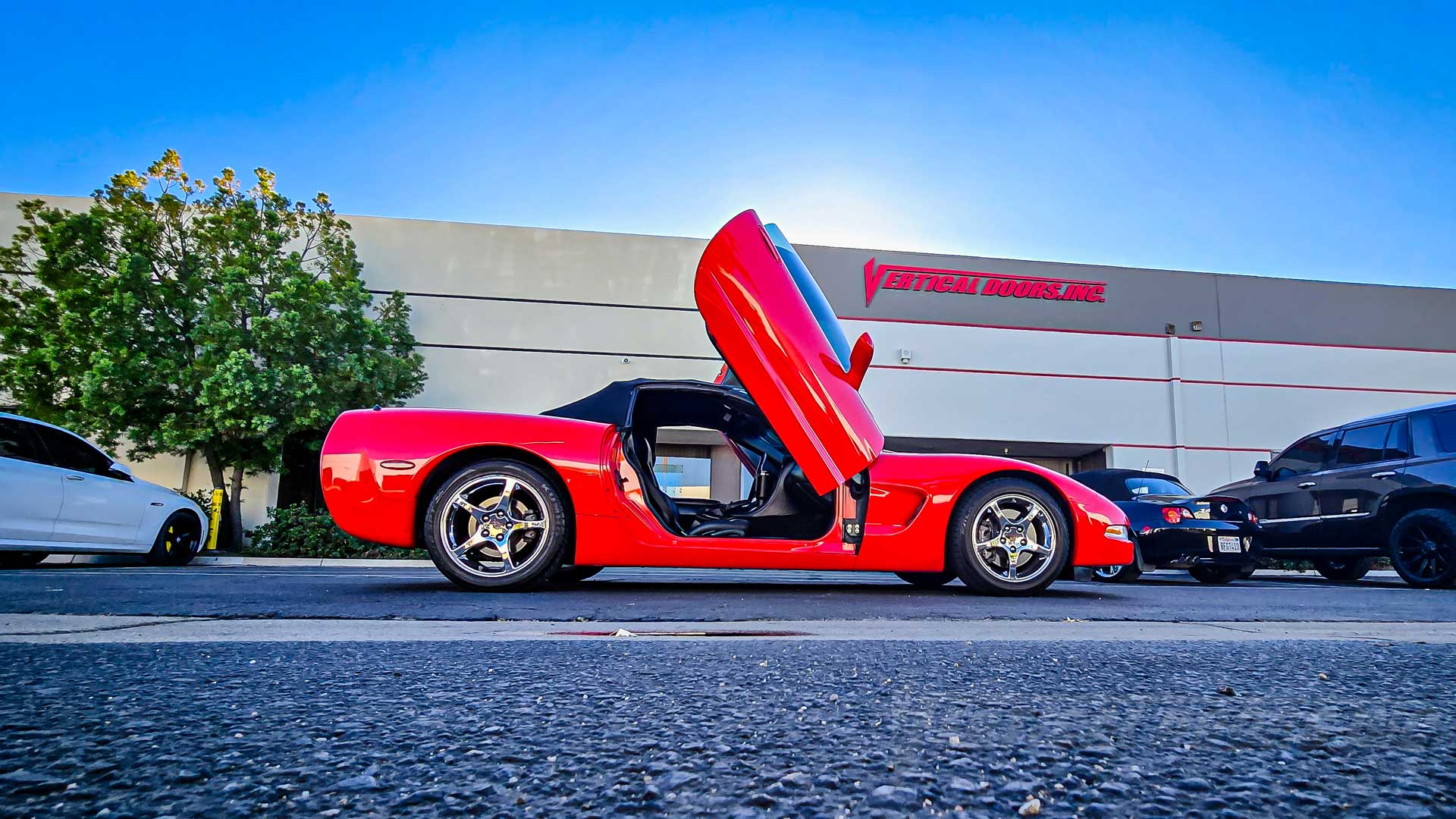 Cal’s Chevrolet Corvette C5 convertible from California with lambo vertical door conversion kit by Vertical Doors, Inc.
