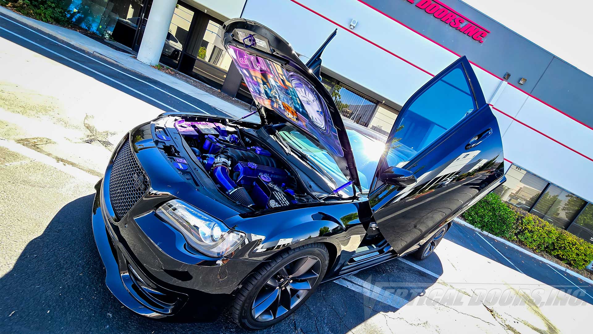 @heelz_nwheelz Chrysler 300 stepping her game up with Lambo Door Conversion Kit by Vertical Doors Inc.