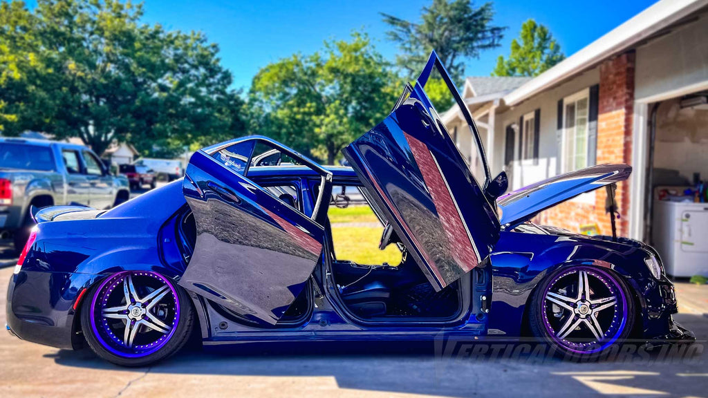 _sassyburrito_ Chrysler 300 from California showing off vertical lambo door conversion kit by Vertical Doors, Inc. she also rocking, vinyl wrap, custom lighting, airbags and many other upgrades, VDCCRY30011, 