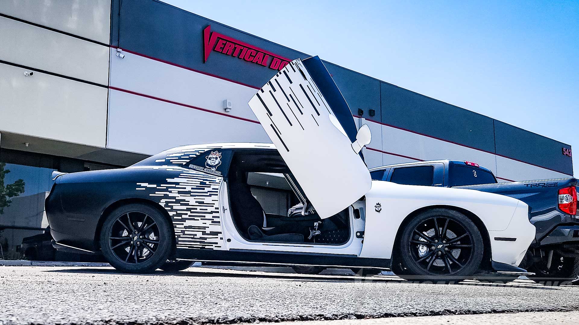 Check out @icedout_challenger Dodge Challenger from California featuring Vertical Doors, Inc. door conversion kit. AKA "Lambo Doors"