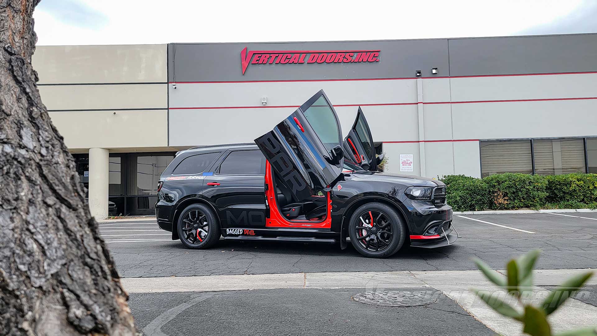 Experience the Ultimate Upgrade for Your Dodge Durango: Vertical Lambo Door Kit by Vertical Doors, Inc.