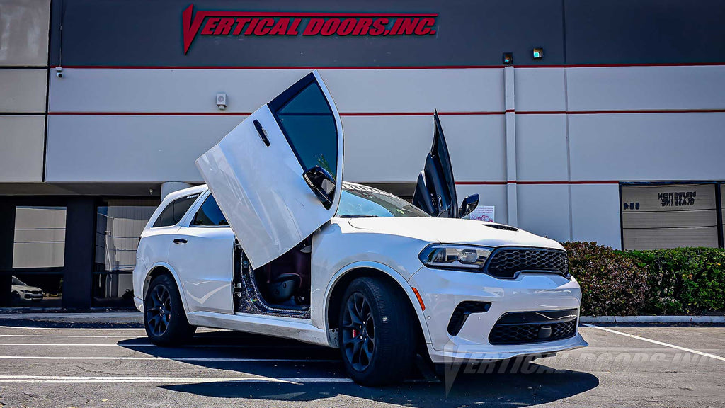Check out the @thehellrango Dodge Durango from Illinois showing off a lambo door kit by Vertical Doors, Inc.