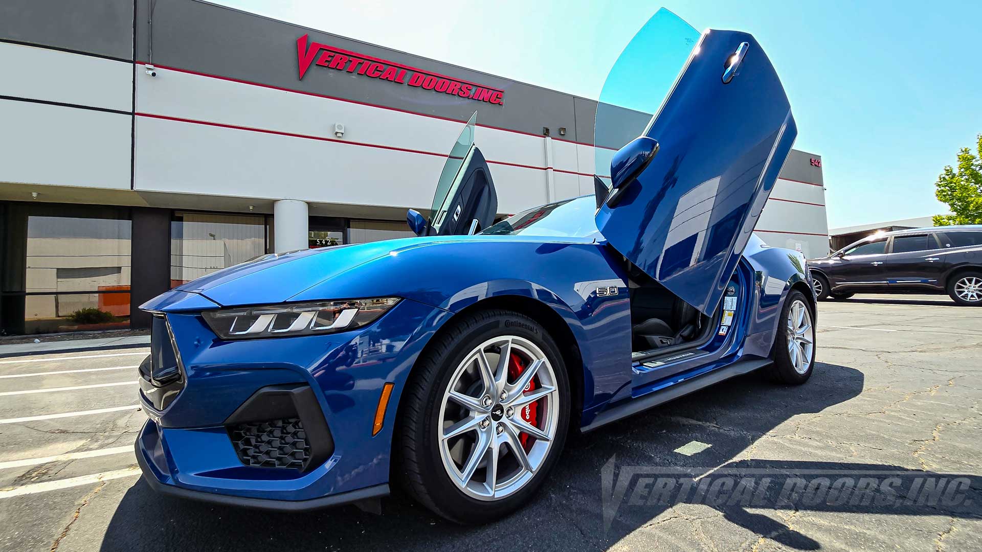 Check out Michael’s 2024 Ford Mustang from California featuring Vertical Doors, Inc. vertical lambo door conversion kit.