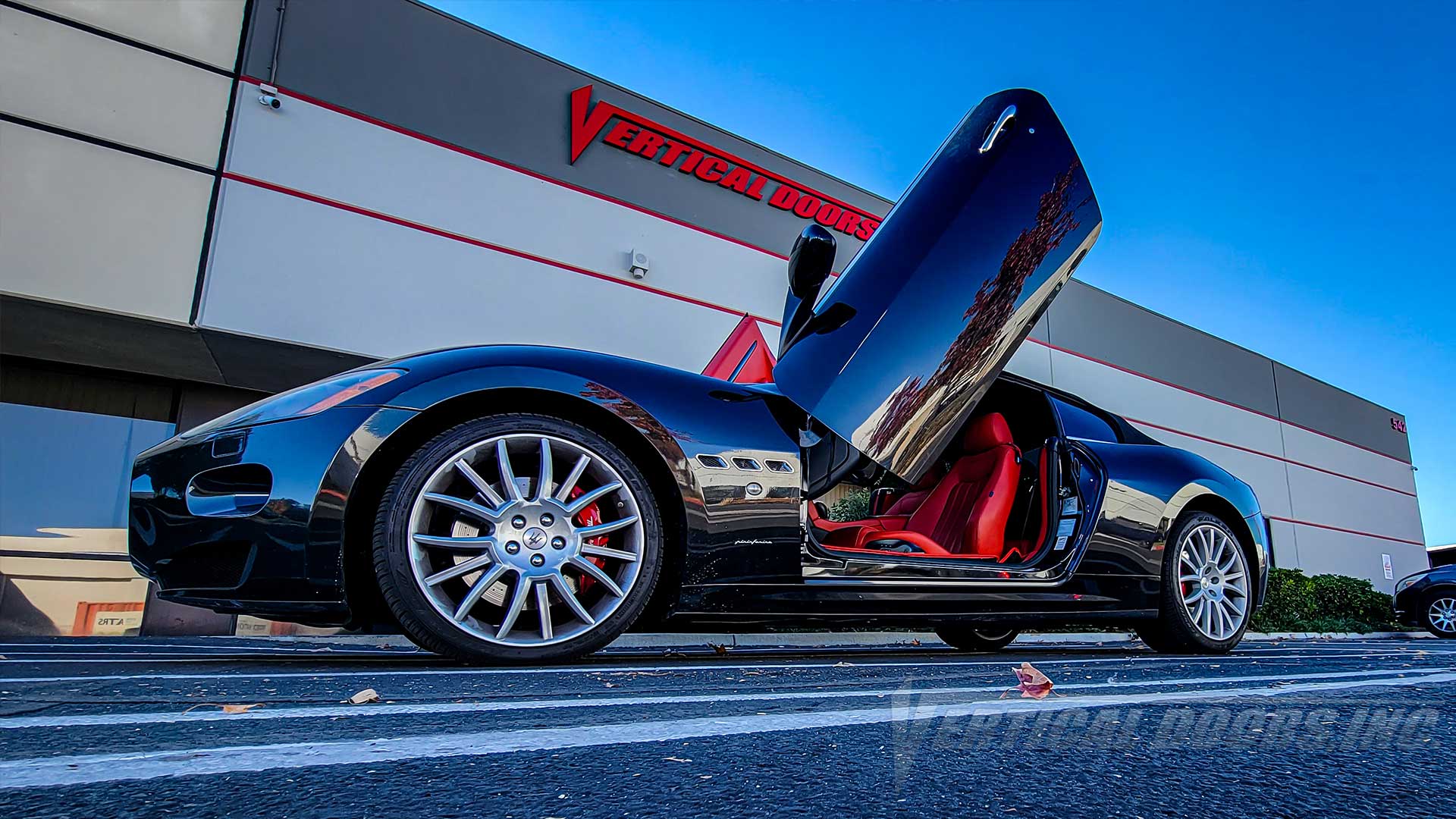 Maserati GranTurismo featuring Vertical Lambo Doors Conversion Kit Manufactured and Installed by Vertical Doors, Inc.