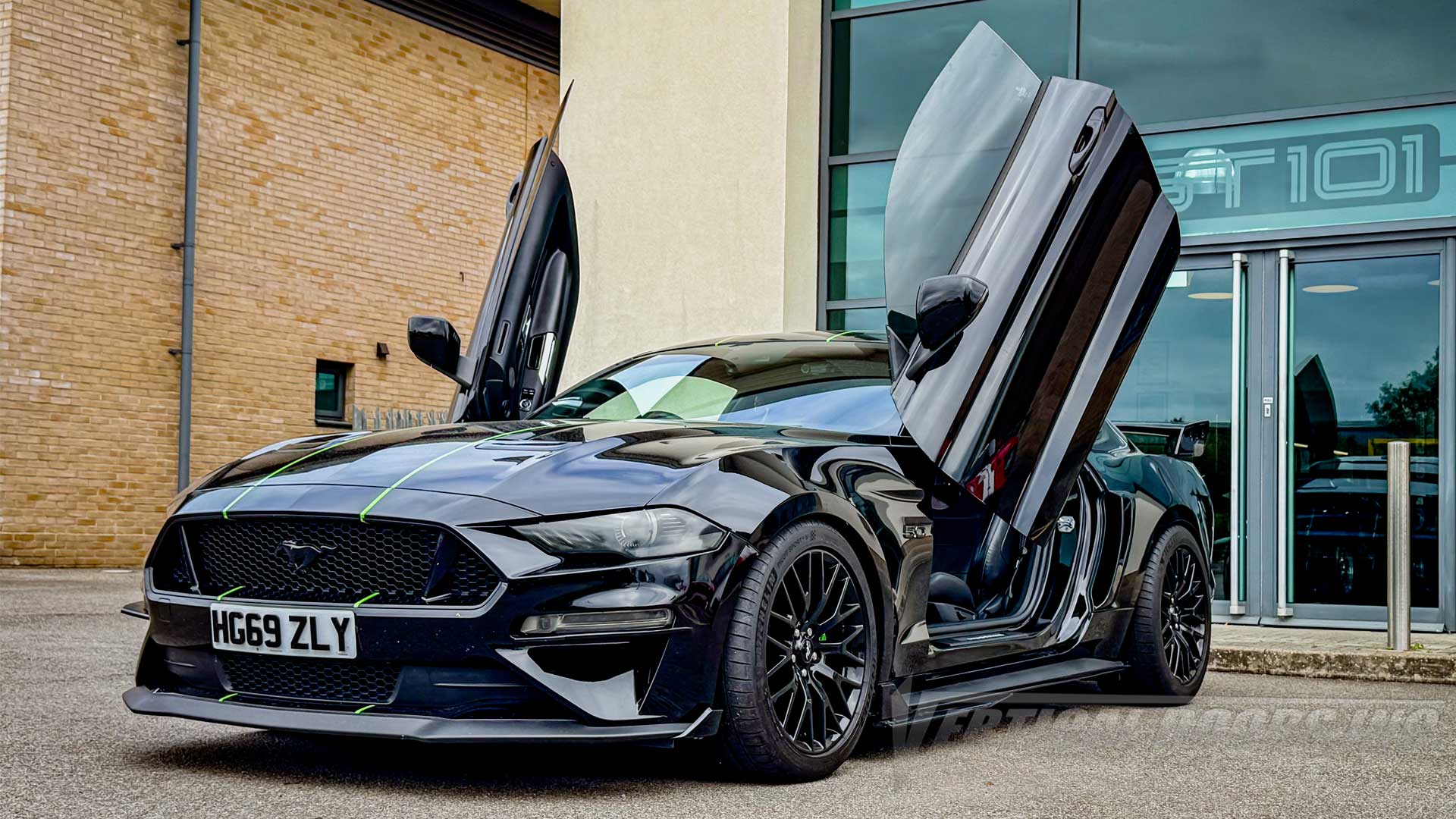 Installer | GT101 Limited | Tollgate West, Colchester, UK | Ford Mustang featuring Vertical Doors, Inc. lambo door conversion kit.