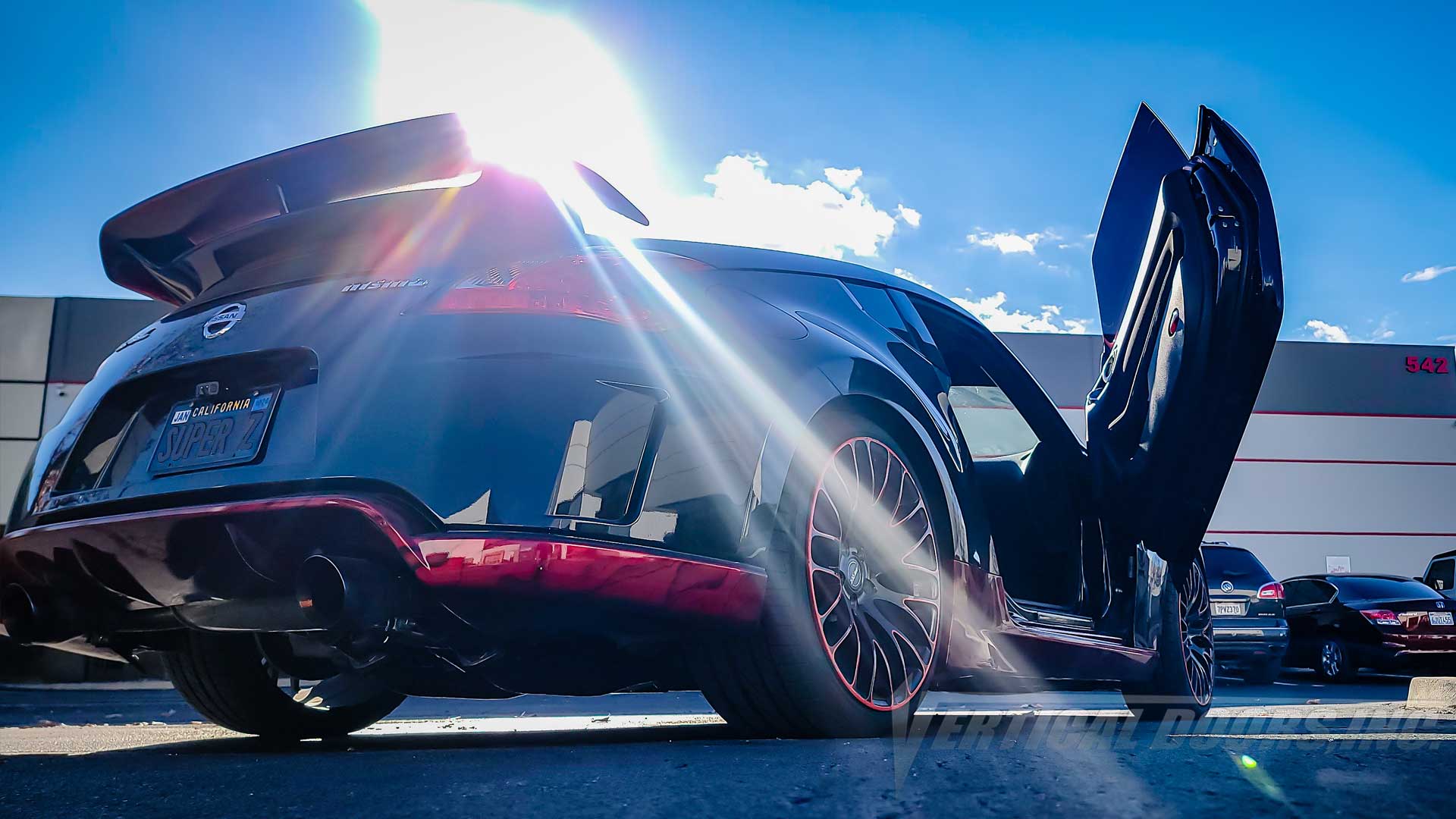 Nissan 370Z Nismo from California showing off its lambo door conversion kit by Vertical Doors, Inc., Get yours now.