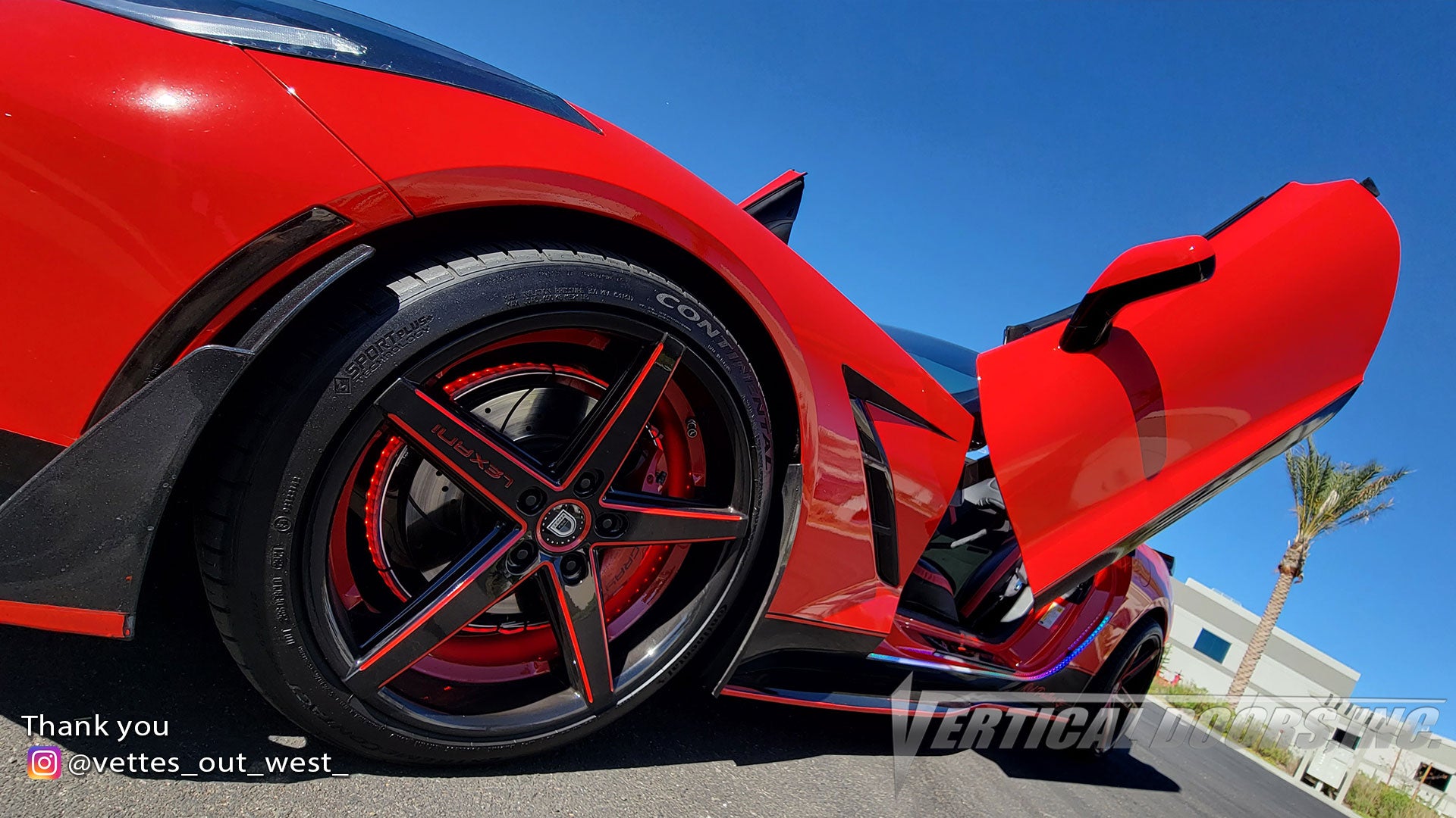Red Chevrolet Corvette C7 from California featuring Vertical Doors, Inc. door conversion kit. AKA "Lambo Doors".