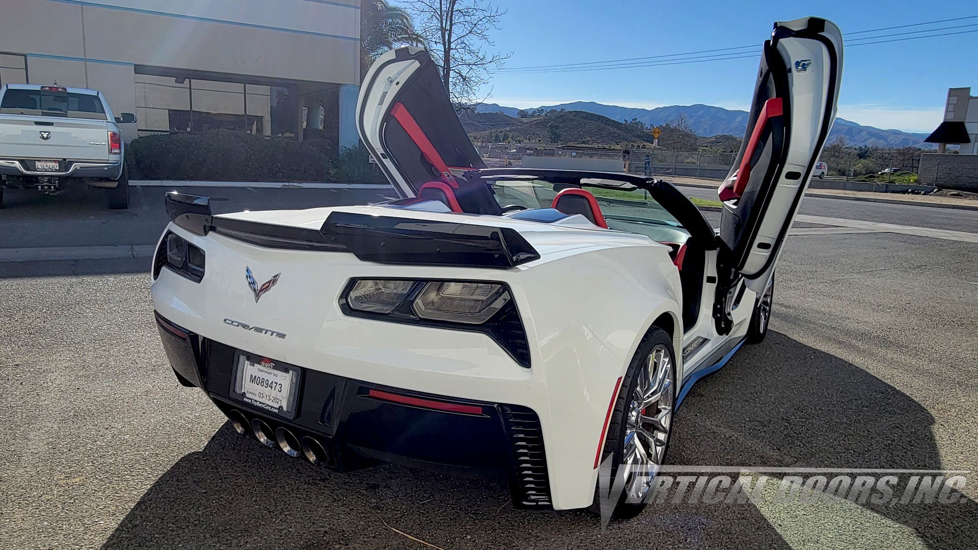 Chevrolet Corvette C7 with Vertical Doors, Inc., vertical lambo door conversion kit.