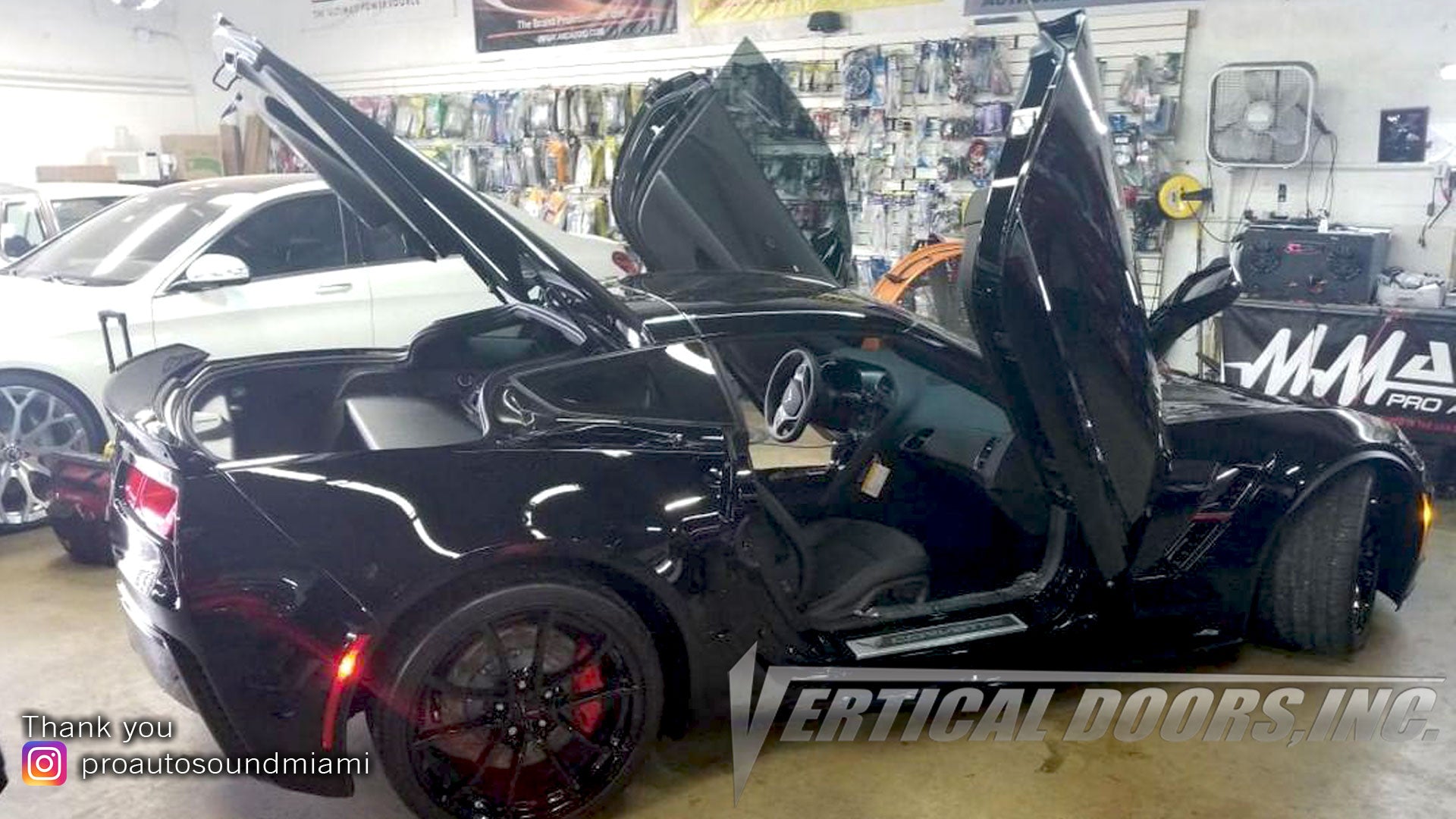 Installer | Pro Auto Sound Miami | Miami, FL | Chevrolet Corvette C-7 featuring Verical Doors, Inc. vertical lambo door conversion kit.
