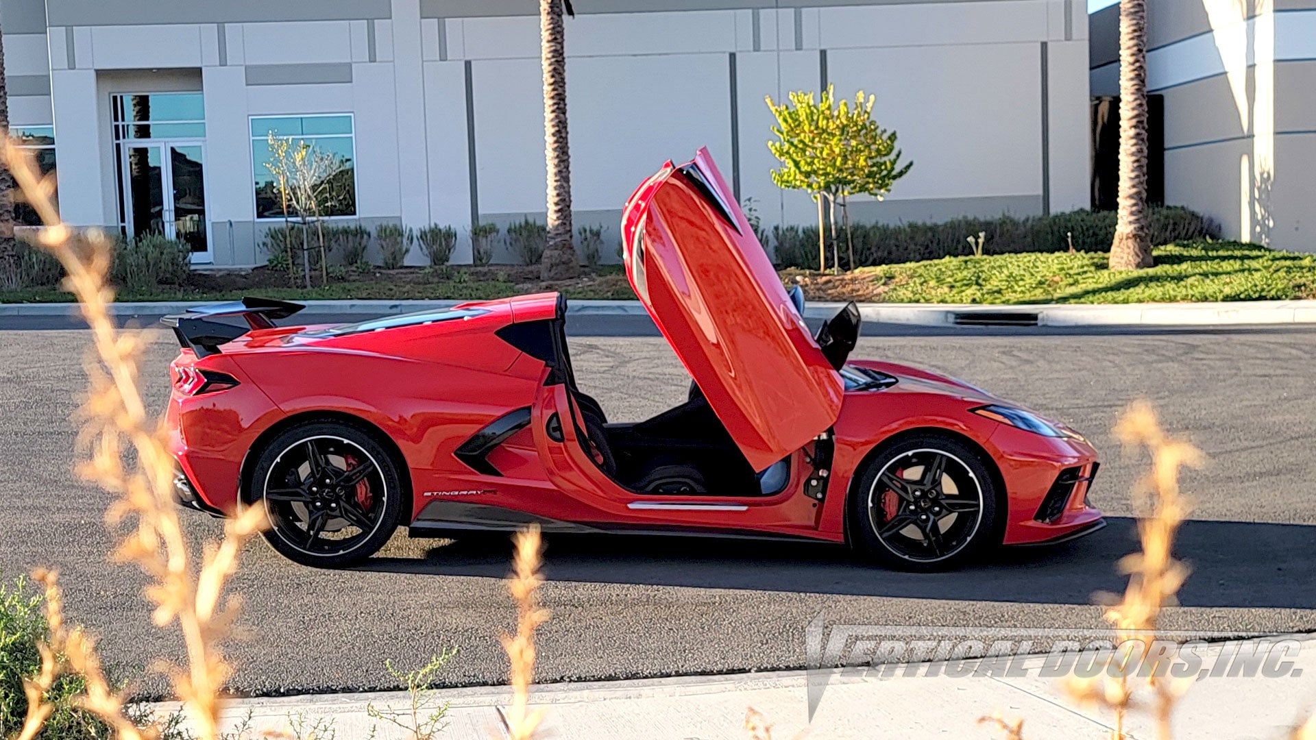 Chevrolet Corvette C8 featuring Vertical Doors, Inc., vertical lambo door conversion kit.