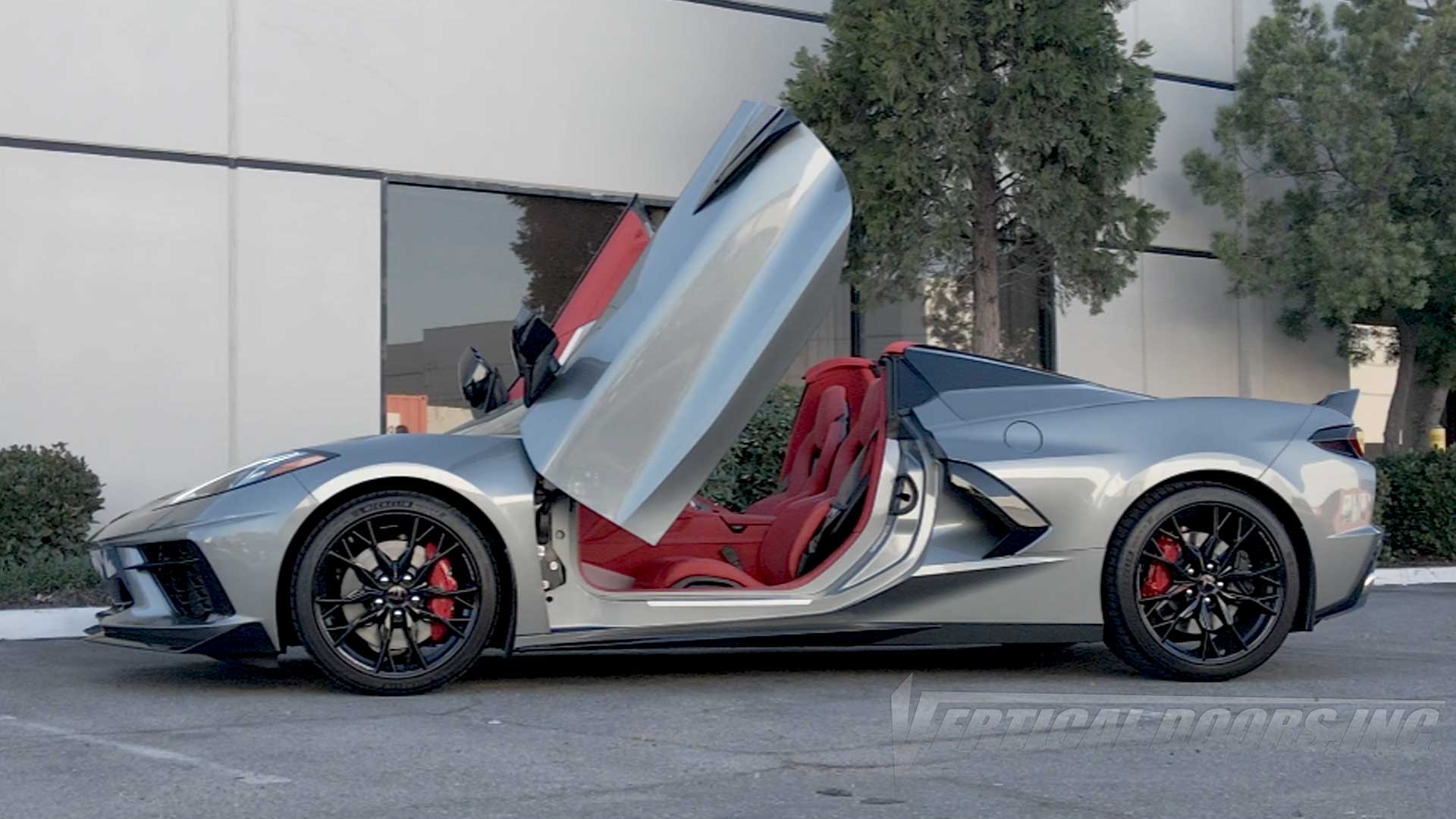Silver Chevrolet Corvette C8 featuring Door conversion kit by Vertical Doors, Inc. AKA "Lambo Doors"