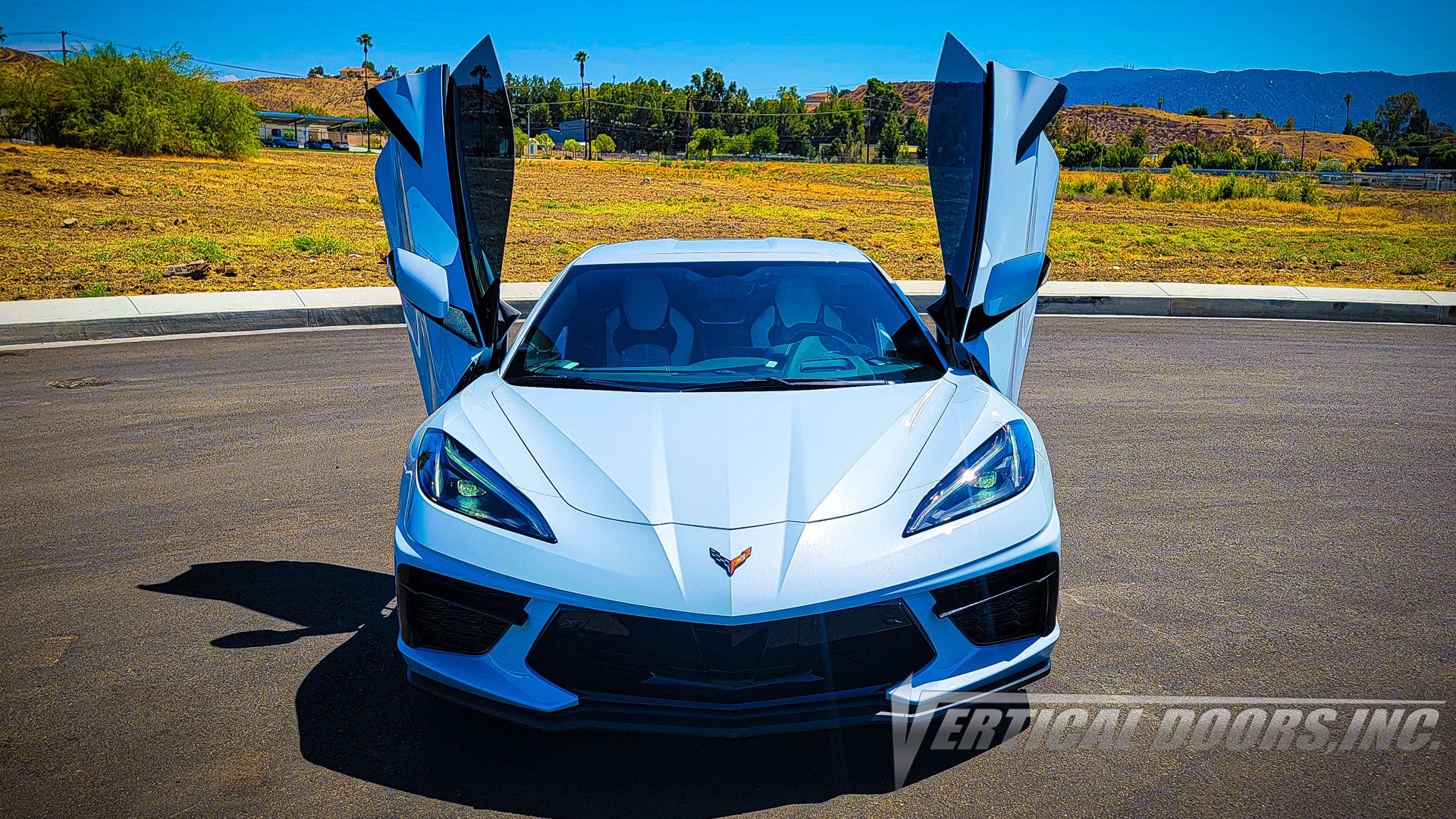 Chevrolet Corvette C8 Ceramic Matrix Gray Metallic from California featuring Vertical Door conversion kit by Vertical Doors, Inc. AKA "Lambo Doors"