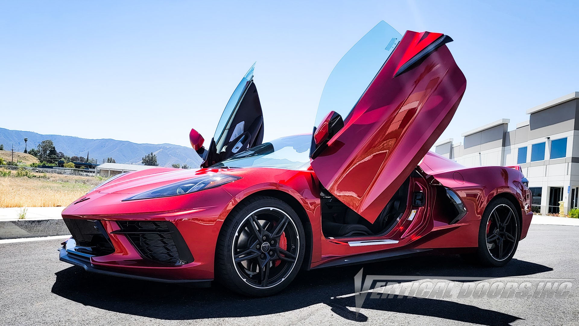 Red Chevrolet Corvette C8 from California featuring Vertical Doors