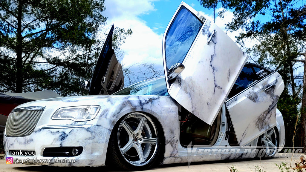 Check out Joey's @get_down_shutup Chrysler 300 from North Carolina, featuring Vertical Lambo Doors Conversion Kit from Vertical Doors, Inc.