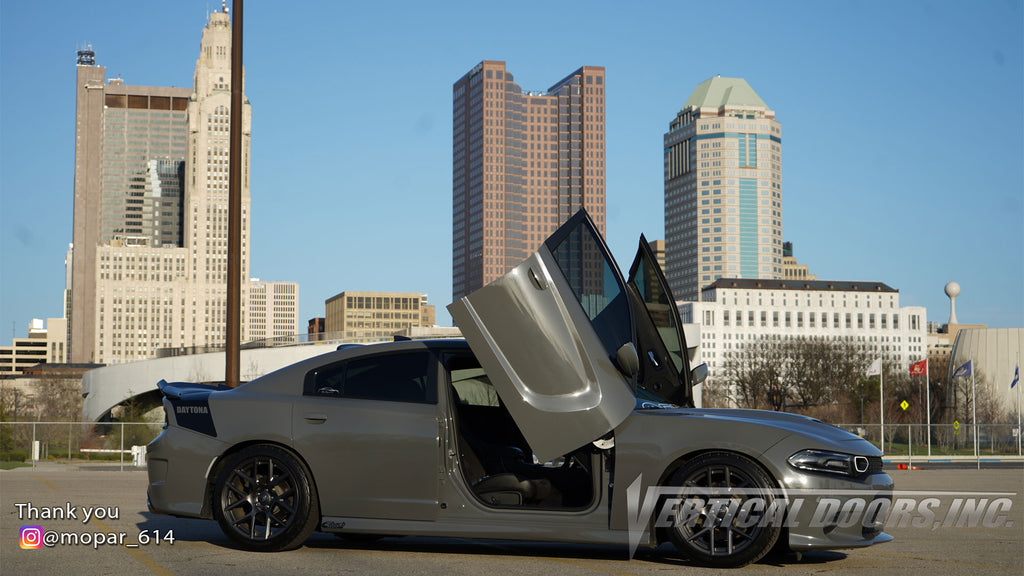 Slide Show | Check out Steve's @mopar_614 Dodge Charger from Ohio featuring Vertical Doors, Inc., vertical lambo doors conversion kit.