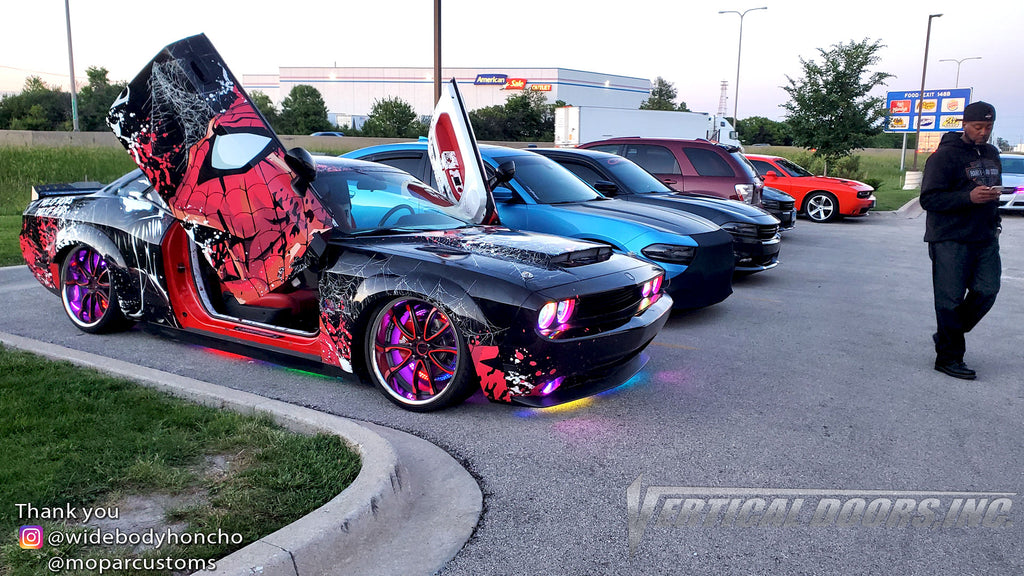 Check out Chad's @widebodyhoncho Dodge Challenger from Chicago featuring Vertical Doors, Inc., Vertical Lambo Doors Conversion Kits.