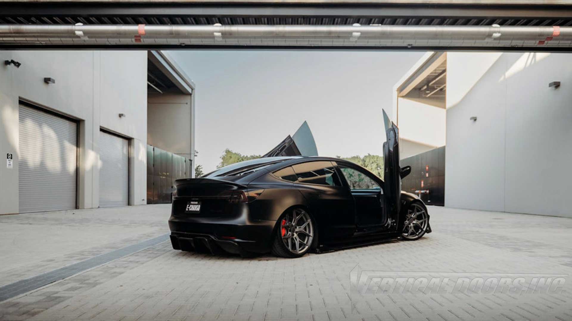 Lambo Door kit @e_chargd Tesla Model 3 from Texas, Kit made by Vertical Doors, Inc. 