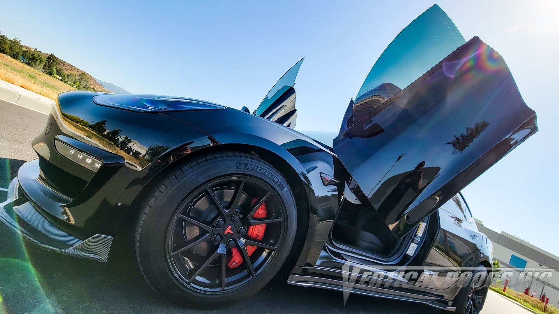 Tesla Model 3 from California featuring Door Conversion kit by Vertical Doors Inc. AKA "Lambo Doors"