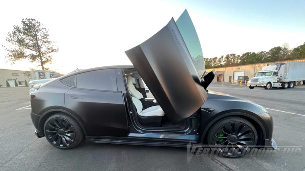 Installer | TESLA MODS NC | Raleigh NC | Tesla Model Y featuring Vertical Doors, Inc. vertical lambo door conversion kit.