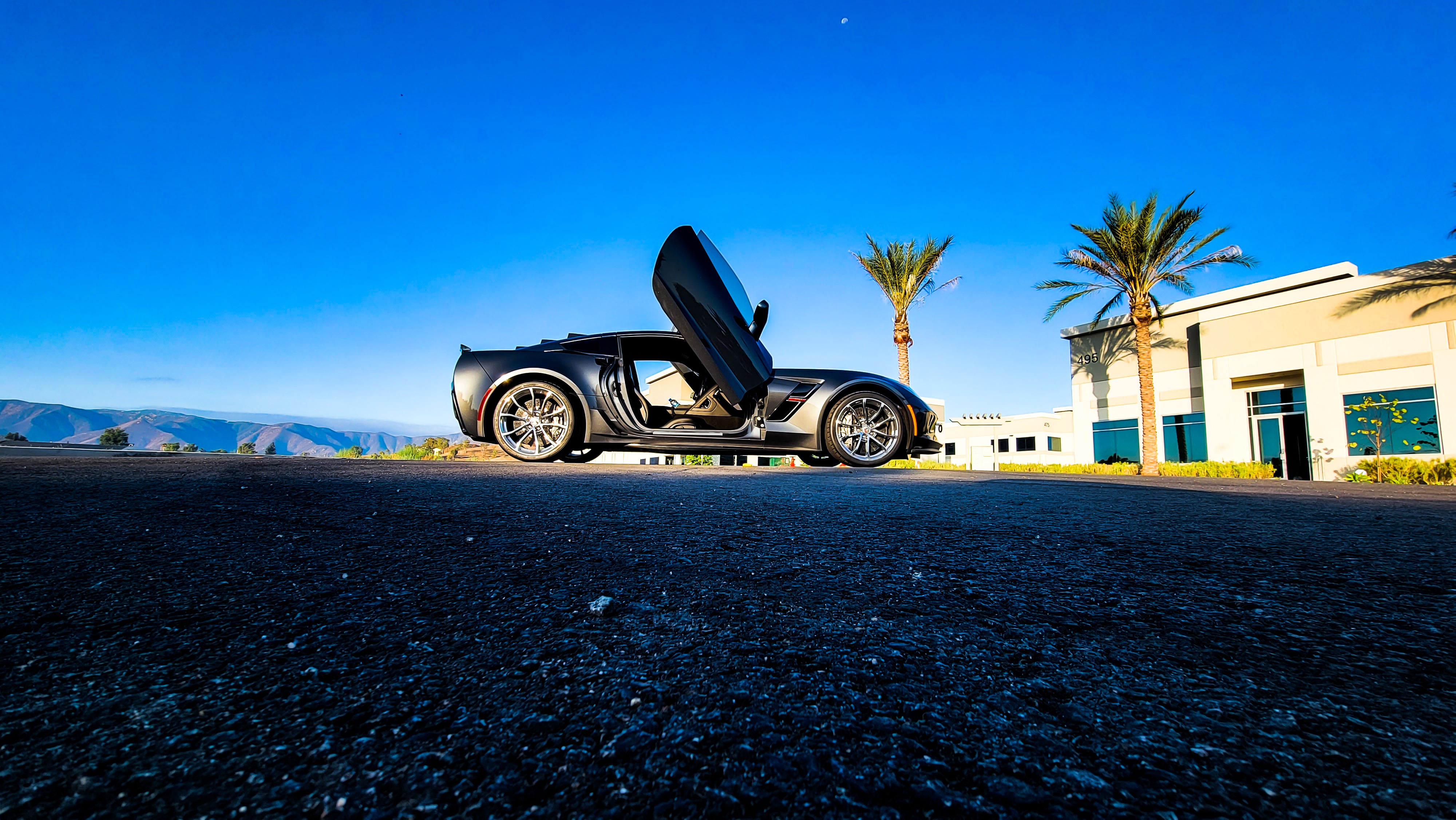@lagniappe_catering Chevrolet Corvette C7 Grand Sport from California featuring Door conversion kit by Vertical Doors, Inc. AKA "Lambo Doors"