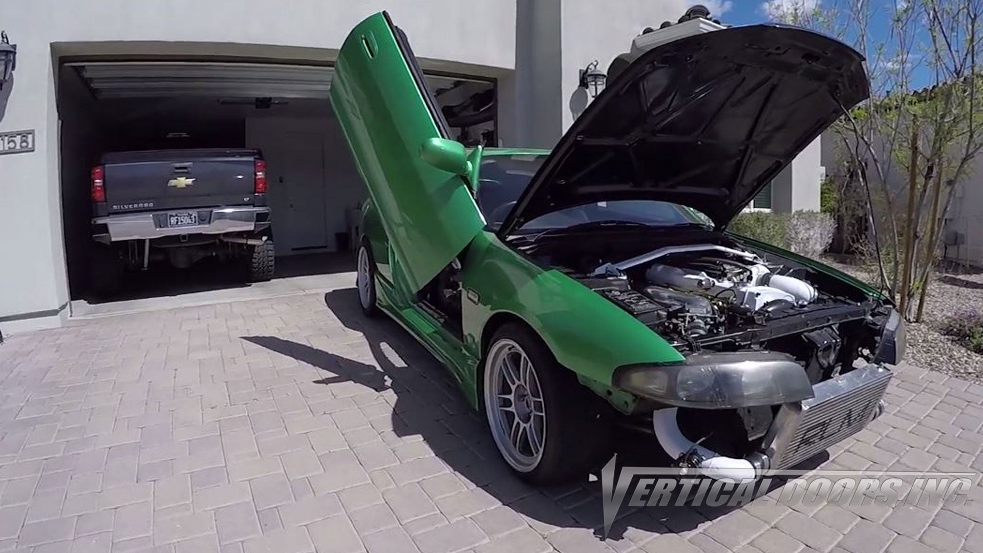 Check out Shane's Nissan Skyline R33 with Vertical Doors, Inc., vertical lambo door conversion kit.