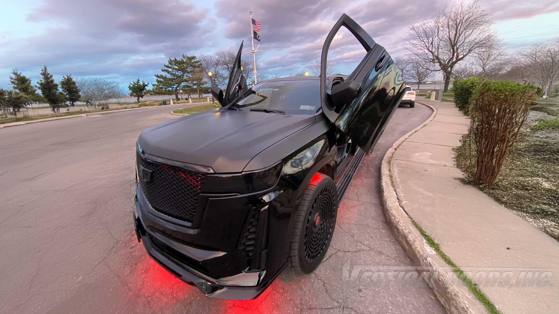 Check out @bxmoneymike 5th Gen 2023 Cadillac Escalade-V showing off Vertical Lambo Door kit by Vertical Door, Inc.
